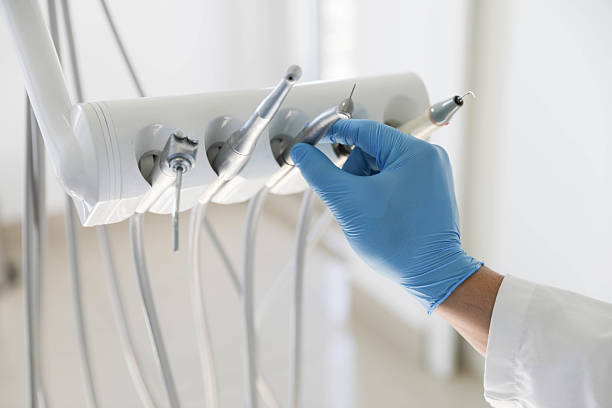 Professional Tooth Extraction technician working in Schaumburg, IL